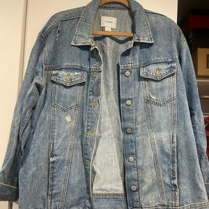 Denim jacket, oversized look.